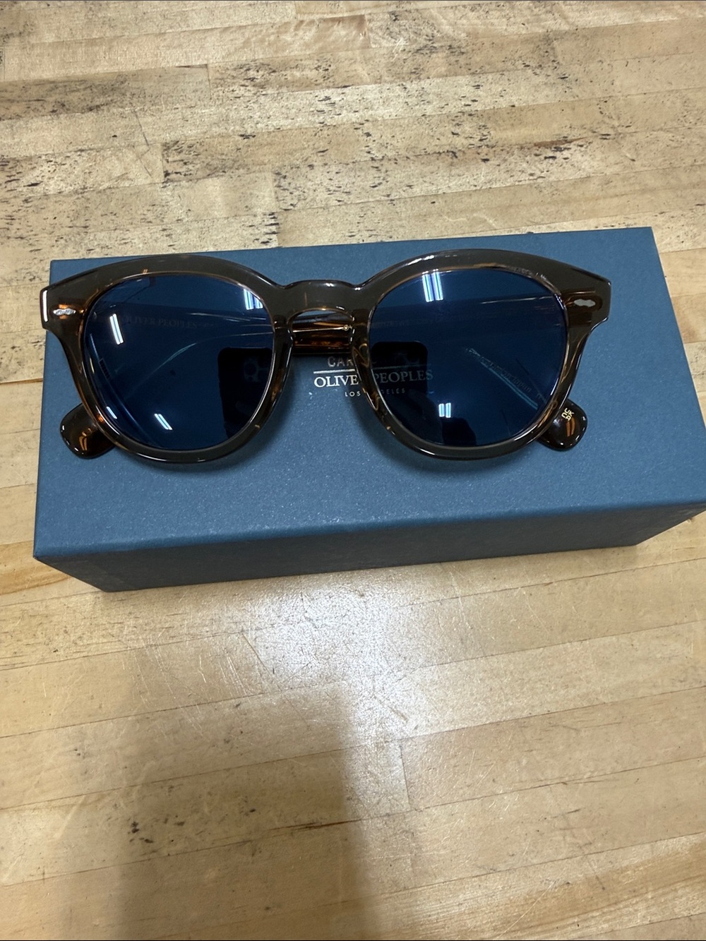 Oliver Peoples ov5513SU Frame Sunglasses with Blue Lenses